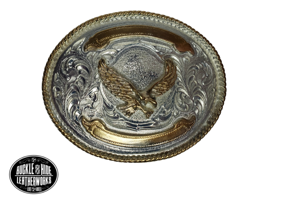 For the Budget minded Western buckle wearer. It's 3" x 4" size will fit up to a 1 1/2" belt strap. It's plated nickel and gold tone looks just like a real Trophy buckles that all Rodeo stars win. Imported from Mexico.