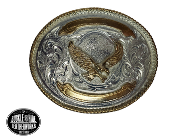 For the Budget minded Western buckle wearer. It's 3" x 4" size will fit up to a 1 1/2" belt strap. It's plated nickel and gold tone looks just like a real Trophy buckles that all Rodeo stars win. Imported from Mexico.