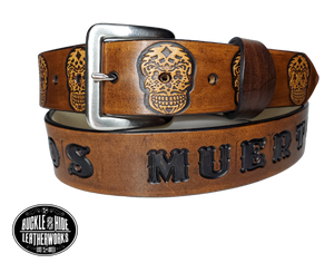 "The Calavera" is a handmade real leather belt made from a single strip of cowhide shoulder leather that is 8-10 oz. or approx. 1/8" thick. It has hand burnished (smoothed) edges and a Sugar Skull pattern. This belt is completely HAND dyed with a multi step finishing technic or basic Earth tones. The antique nickel plated solid brass buckle is snapped in place with heavy snaps.  This belt is made just outside Nashville in Smyrna, TN.