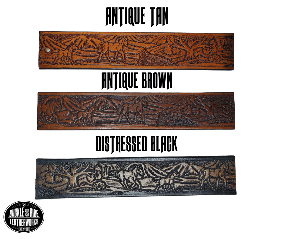 "The Stallion" is a handmade real leather belt made from a single strip of cowhide shoulder leather that is 8-10 oz. or approx. 1/8" thick. It has hand burnished (smoothed) edges and a Wild Horse scene embossed pattern down the center. This belt is completely HAND dyed with a multi step finishing technic. The antique nickel plated solid brass buckle is snapped in place with heavy snaps.  This belt is made just outside Nashville in Smyrna, TN.