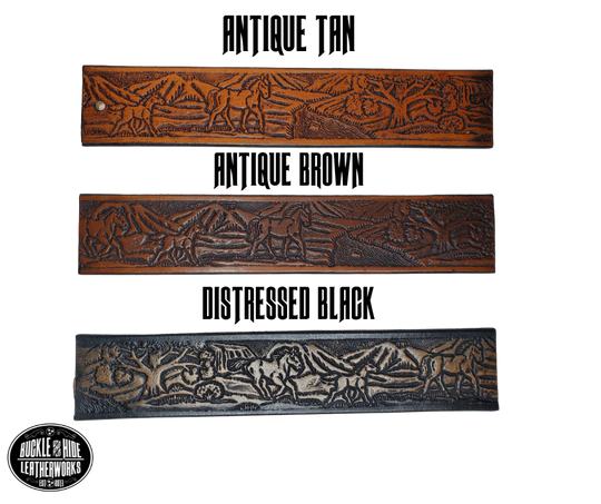 "The Stallion" is a handmade real leather belt made from a single strip of cowhide shoulder leather that is 8-10 oz. or approx. 1/8" thick. It has hand burnished (smoothed) edges and a Wild Horse scene embossed pattern down the center. This belt is completely HAND dyed with a multi step finishing technic. The antique nickel plated solid brass buckle is snapped in place with heavy snaps.  This belt is made just outside Nashville in Smyrna, TN.