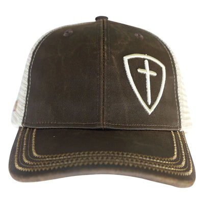 This handsome cap says a lot about the character of its wearer...without saying a word. The cross is meaningful and carries weight with just a glance. Send a message about what this symbol means to you every time you wear this topper, and share the Good News with others when you have the chance. Ask God for the opportunity, and He will help you with the words. Available online or in our shop just outside Nashville in Smyrna, TN.