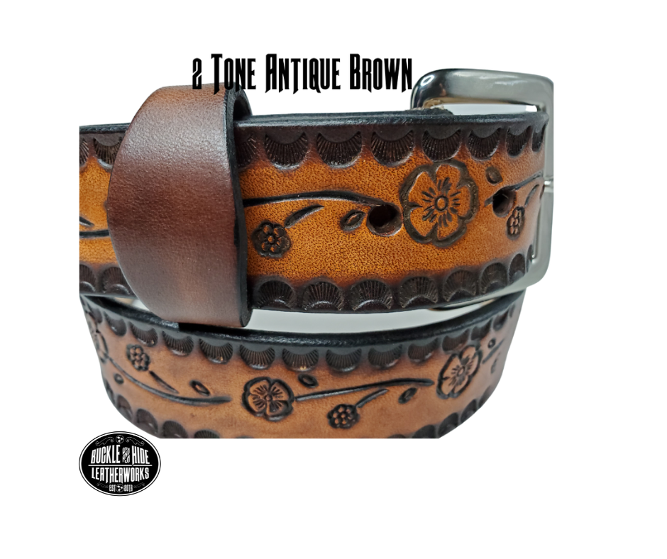 The Esther handmade all leather belt is made from a single strip of Veg-Tan cowhide that is a hand finished Veg-tan that is 9-10 oz., or approx. 1/8" thick and is 1 1/2" thick. It has an Vintage style embossed design that is never out of style!  The antique nickel plated solid brass buckle is snapped in place. This belt is made just outside Nashville in Smyrna, TN. Perfect for casual and dress wear, it can be for personal use or for groomsman gifts or other gifts as well. 
