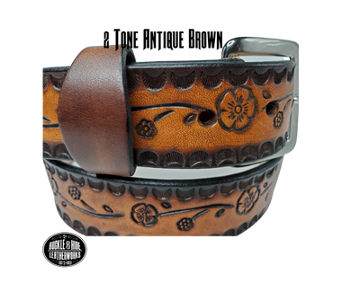 The Esther handmade all leather belt is made from a single strip of Veg-Tan cowhide that is a hand finished Veg-tan that is 9-10 oz., or approx. 1/8" thick and is 1 1/2" thick. It has an Vintage style embossed design that is never out of style!  The antique nickel plated solid brass buckle is snapped in place. This belt is made just outside Nashville in Smyrna, TN. Perfect for casual and dress wear, it can be for personal use or for groomsman gifts or other gifts as well. 