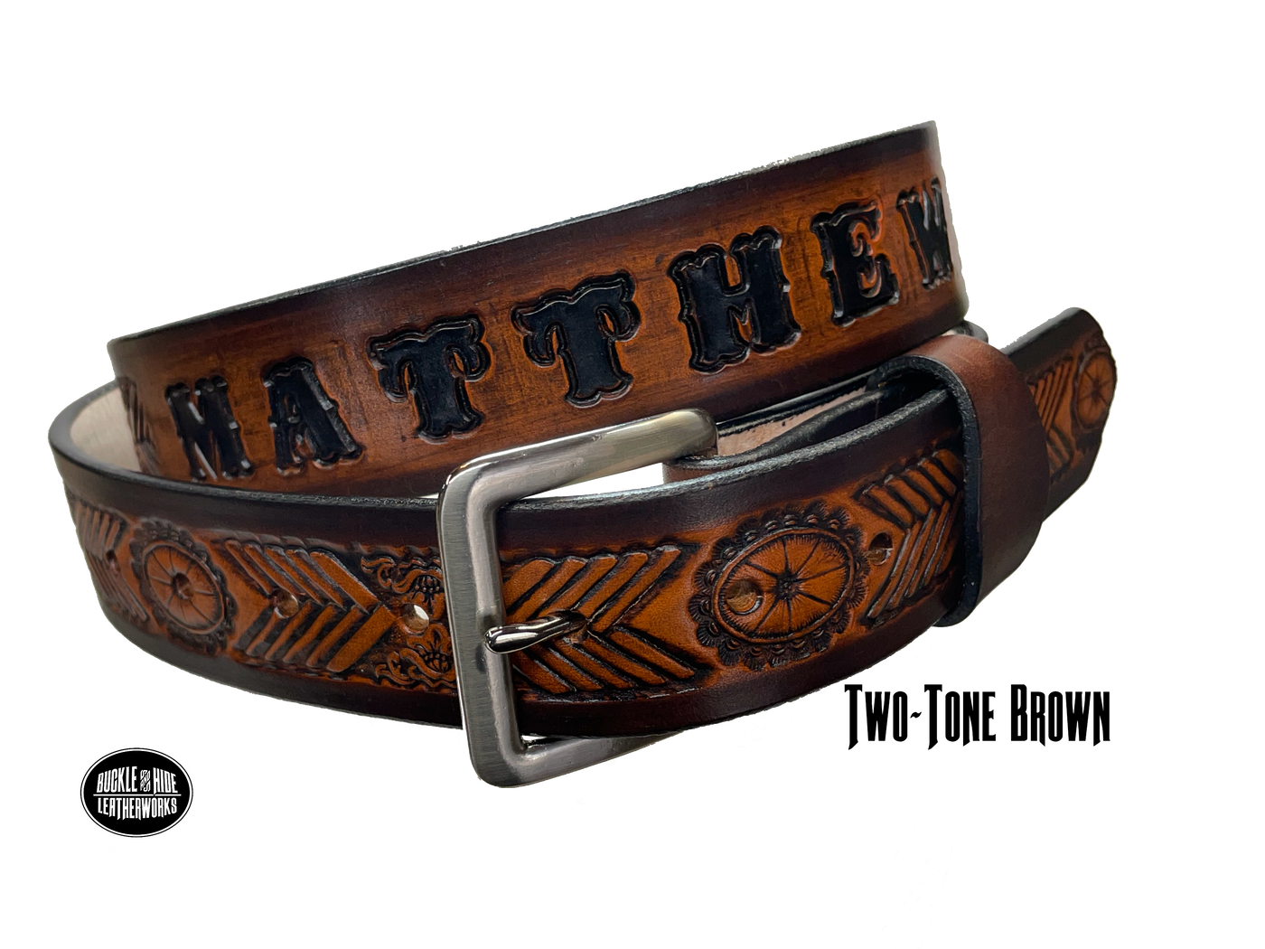 Full grain American vegetable tanned cowhide approx. 1/8"thick. Width 1 1/2" and includes Antique Nickle plated Solid Brass buckle Hand Finished in 3 color options Smooth burnished painted edges Choose with or without name, if without name, design will cover entire length of belt For name Type name desired on belt in "Type Name Here" section, no more than 8 letters maximum Buckle snaps in place for easy changing if desired Made in our Smyrna, TN, USA shop Belt Sizing Instructions
