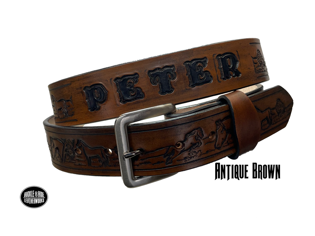 Full grain American vegetable tanned cowhide approx. 1/8"thick. Width 1 1/2" and includes Antique Nickle plated Solid Brass buckle Hand Finished in 3 color options Smooth burnished painted edges Choose with or without name, if without name, design will cover entire length of belt For name Type name desired on belt in "Type Name Here" section, no more than 8 letters maximum Buckle snaps in place for easy changing if desired Made in our Smyrna, TN, USA shop Belt Sizing Instructions