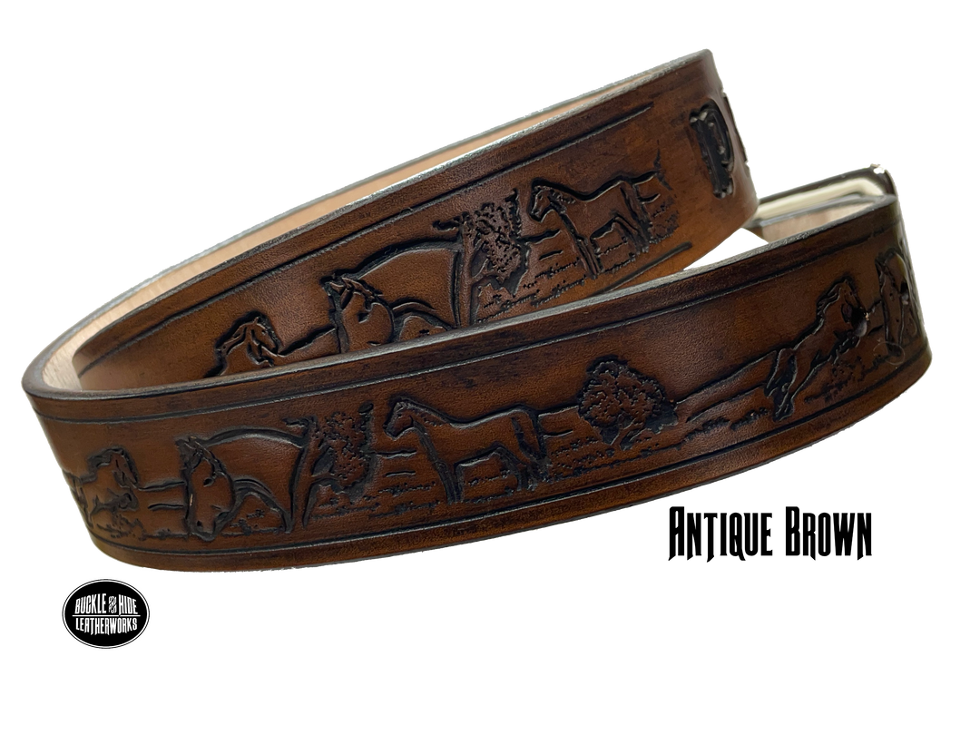 Full grain American vegetable tanned cowhide approx. 1/8"thick. Width 1 1/2" and includes Antique Nickle plated Solid Brass buckle Hand Finished in 3 color options Smooth burnished painted edges Choose with or without name, if without name, design will cover entire length of belt For name Type name desired on belt in "Type Name Here" section, no more than 8 letters maximum Buckle snaps in place for easy changing if desired Made in our Smyrna, TN, USA shop Belt Sizing Instructions