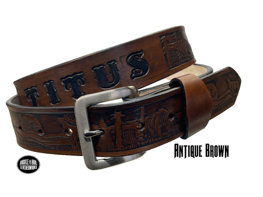 Take a trip to the majestic Colorado Rockies with this unique Name belt with elk, Bear, and Eagle Veg-tan leather approx. 1/8" thick. Hand finished in 3 color options and includes tasteful brass buckle. Easy buckle change with snaps, you'll be ready for every adventure! made in our Smyrna, TN shop just outside Nashville.