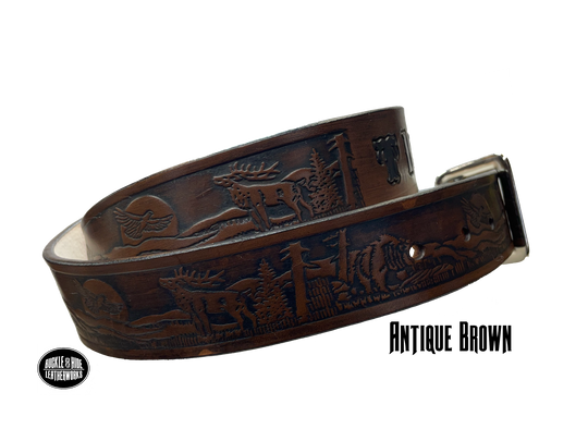 Take a trip to the majestic Colorado Rockies with this unique Name belt with elk, Bear, and Eagle Veg-tan leather approx. 1/8" thick. Hand finished in 3 color options and includes tasteful brass buckle. Easy buckle change with snaps, you'll be ready for every adventure! made in our Smyrna, TN shop just outside Nashville.