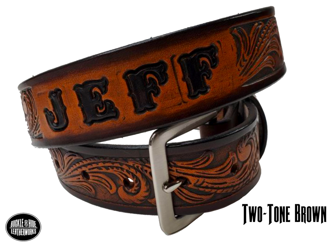 Our Rustler Name Leather Belt is Full grain American vegetable tanned cowhide approx. 1/8"thick. Width 1 1/2" and includes Antique Nickle plated Solid Brass buckle. Hand Finished and Smooth burnished painted edges. Choose with or without name, if without name, design will cover entire length of belt. For name Type name desired on belt in "Type Name Here" section, no more than 10 letters maximum. Buckle snaps in place for easy changing if desired. Made in our Smyrna, TN, USA shop.
