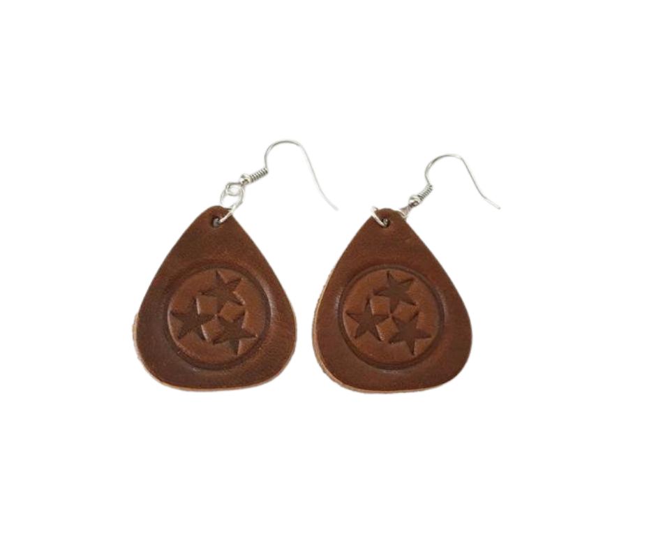 Tennessee Tri-Star Guitar pick earrings. Cut in the shape of a guitar pick and embossed with the Tennessee Tri-Star Logo. Made from Tennessee tanned cowhide leather in Smyrna Tenn. That's a lot of Tennessee! Nickle free ear wires