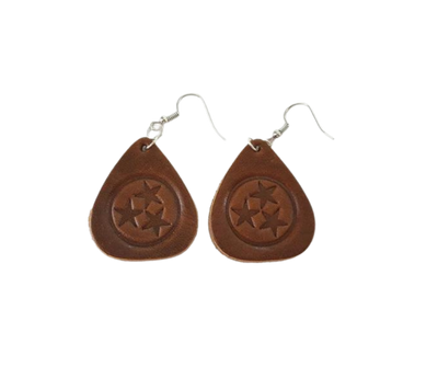 Tennessee Tri-Star Guitar pick earrings. Cut in the shape of a guitar pick and embossed with the Tennessee Tri-Star Logo. Made from Tennessee tanned cowhide leather in Smyrna Tenn. That's a lot of Tennessee! Nickle free ear wires