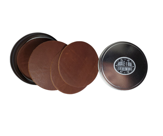 Made in our shop in Smyrna, TN just outside Nashville TN. Real cowhide approx. 3/16"thick in a 3 5/8" diameter coaster. 10 coasters in a tin case. Great for groomsmen gifts, Weddings, Events and more. Contact us for bulk purchases of 50 or 500...   