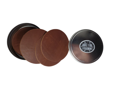 Made in our shop in Smyrna, TN just outside Nashville TN. Real cowhide approx. 3/16"thick in a 3 5/8" diameter coaster. 10 coasters in a tin case. Great for groomsmen gifts, Weddings, Events and more. Contact us for bulk purchases of 50 or 500...   