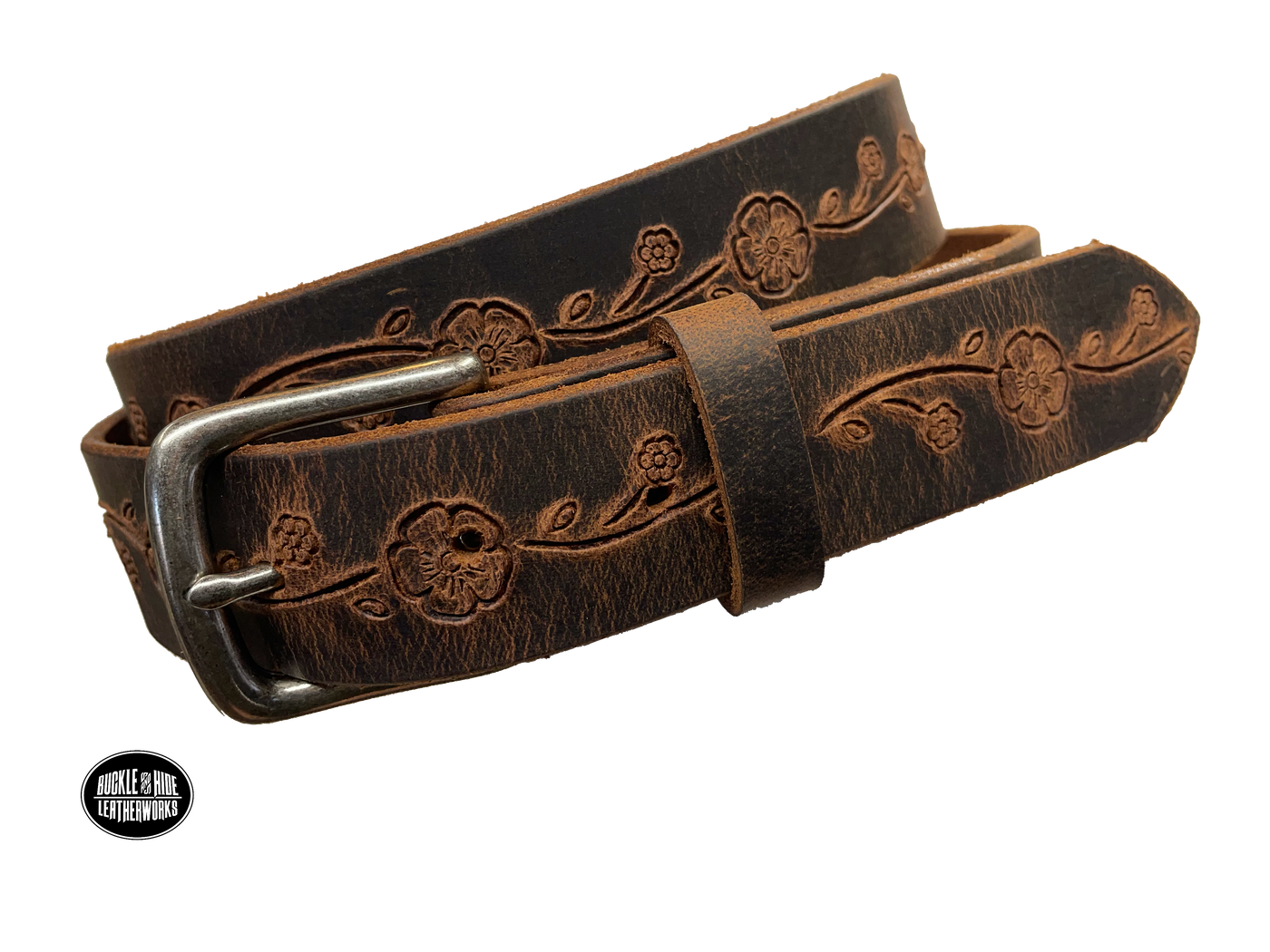 This brown leather belt is made from Crazy Horse tanned leather for that distressed and pull-up look. The edges are beveled and left raw for a contrasting look. It has an antique nickel coated solid brass buckle that is snapped in place. Belt is 1 1/4" wide and available in lengths from 34" to 44".  It is handmade in our shop in Smyrna, TN, just outside of Nashville.