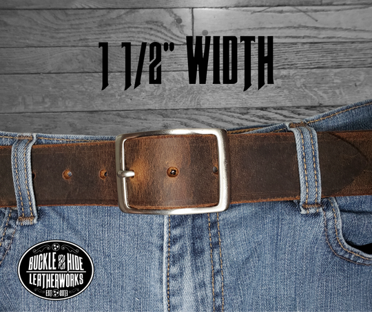 This rustic Townsend" Viejo Marron leather belt is made from Crazy Horse tanned leather for that distressed and used look. The edges are beveled and burnished left the natural color for a contrasting appearance. It has an antique nickel plated Center Bar style buckle that is snapped in place, so you can change it if you want for a totally different look. Belt is 1 1/2" wide and available in lengths from 32" to 44". It is handmade in our shop in Smyrna, TN, just outside of Nashville.