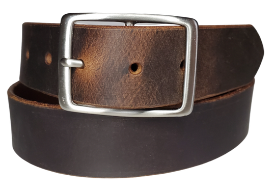 This rustic Townsend" Viejo Marron leather belt is made from Crazy Horse tanned leather for that distressed and used look. The edges are beveled and burnished left the natural color for a contrasting appearance. It has an antique nickel plated Center Bar style buckle that is snapped in place, so you can change it if you want for a totally different look. Belt is 1 1/2" wide and available in lengths from 32" to 44". It is handmade in our shop in Smyrna, TN, just outside of Nashville.