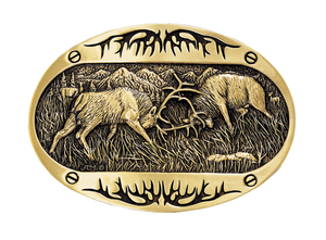 Brass colored oval Montana Silversmith's Attitude series buckle with rutting elk and antler designs at the top and bottom. Standard 1.5 belt swivel.  Amazing detail of 2 Elk fighting with their heads down with a mountain scene background Available at our shop just outside Nashville in Smyrna, TN. Dimensions: Width 3.63" Height 2.75" Length 0.16"