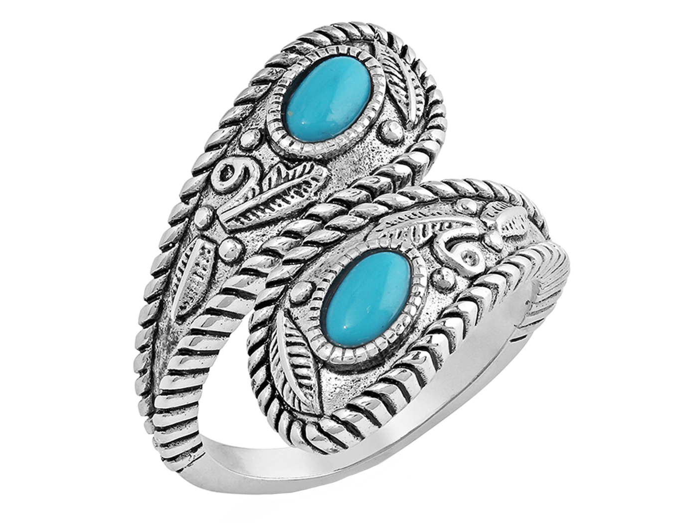 Open ring that is antiqued-silver in color and wraps around the finger to overlap. The twists and curls of the silver are accented by etched florals and filigree. The ends are teardrop in shape and hold a turquoise stone in the middle. Stone color and shape may vary. Rhodium over a sterling silver base. Synthetic turquoise. Available online or at our shop just outside Nashville in Smyrna, TN. 