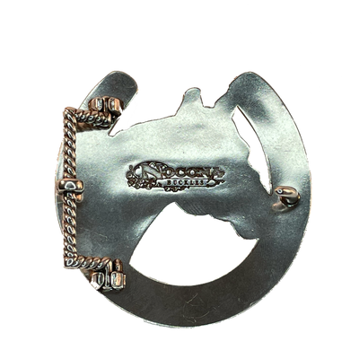Nocona horse head and horseshoe buckle Dimensions are 2 3/4" tall by 4" wide Has horse head pictured in center of buckle surrounded by a horseshoe behind it. Nocona horse head and horseshoe buckle Dimensions are 2 3/4" tall by 3" wide Has horse head pictured in center of buckle surrounded by a horseshoe behind it. 