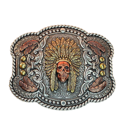 Nocona Indian Chief Skull belt buckle Rectangle shaped buckle with a stylish smooth edge. It features a centered Indian chief skull with headdress and feather motif surrounded by western scroll engraving. Copper and brass colors throughout. Measures 3-1/2" wide x 2-1/2" tall Fits belts up to 1 1/2" wide Available online or in our shop in Smyrna, TN just outside Nashville Add an authentic western look to your favorite belt.
