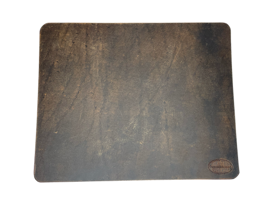 This heavy Bridle leather mouse pad with hand burnished smooth edges and is approx. 1/8" thick. Size is 8" x 10".  This size gives you plenty of room to mouse around! May choose plain or with 1-3 initials stamped in lower left corner with our logo stamped in the lower right corner. Made in our shop just outside Nashville in Smyrna, TN.