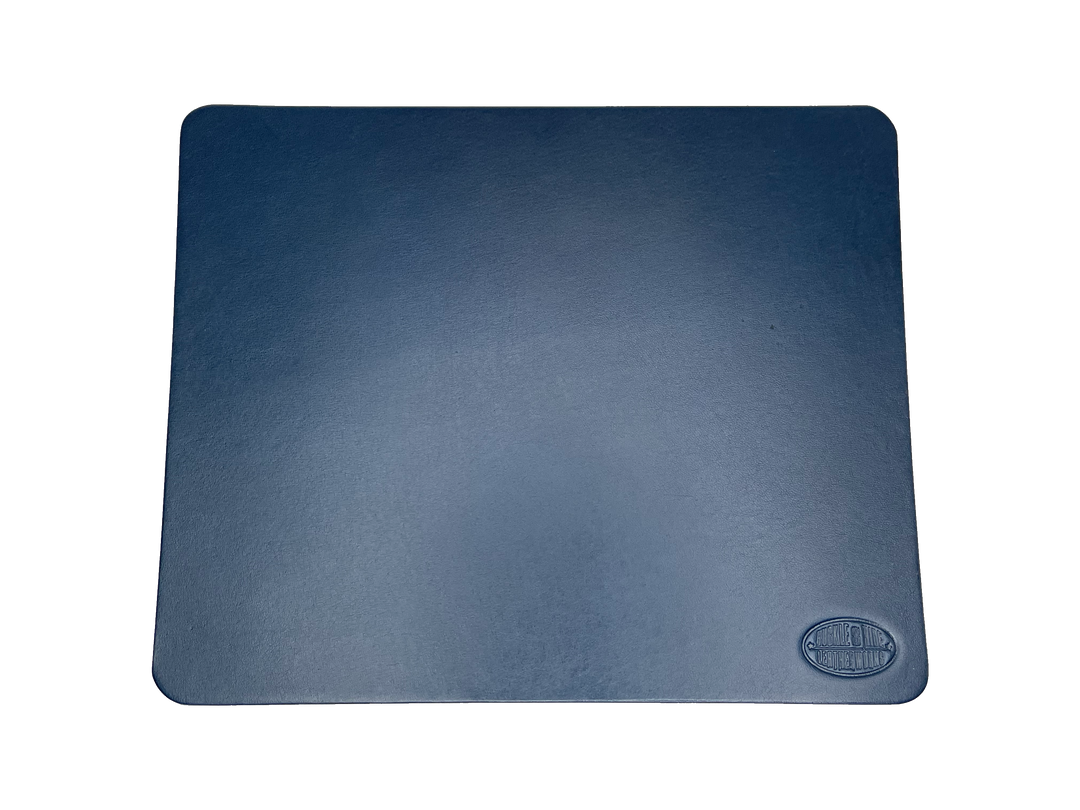 This heavy Bridle leather mouse pad with hand burnished smooth edges and is approx. 1/8" thick. Size is 8" x 10".  This size gives you plenty of room to mouse around! May choose plain or with 1-3 initials stamped in lower left corner with our logo stamped in the lower right corner. Made in our shop just outside Nashville in Smyrna, TN.