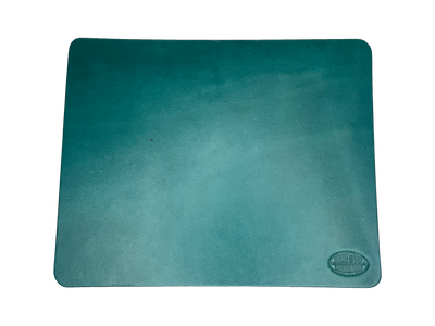 This heavy Bridle leather mouse pad with hand burnished smooth edges and is approx. 1/8" thick. Size is 8" x 10".  This size gives you plenty of room to mouse around! May choose plain or with 1-3 initials stamped in lower left corner with our logo stamped in the lower right corner. Made in our shop just outside Nashville in Smyrna, TN.