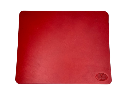 This heavy Bridle leather mouse pad with hand burnished smooth edges and is approx. 1/8" thick. Size is 8" x 10".  This size gives you plenty of room to mouse around! May choose plain or with 1-3 initials stamped in lower left corner with our logo stamped in the lower right corner. Made in our shop just outside Nashville in Smyrna, TN.