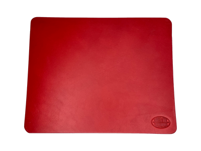This heavy Bridle leather mouse pad with hand burnished smooth edges and is approx. 1/8" thick. Size is 8" x 10".  This size gives you plenty of room to mouse around! May choose plain or with 1-3 initials stamped in lower left corner with our logo stamped in the lower right corner. Made in our shop just outside Nashville in Smyrna, TN.