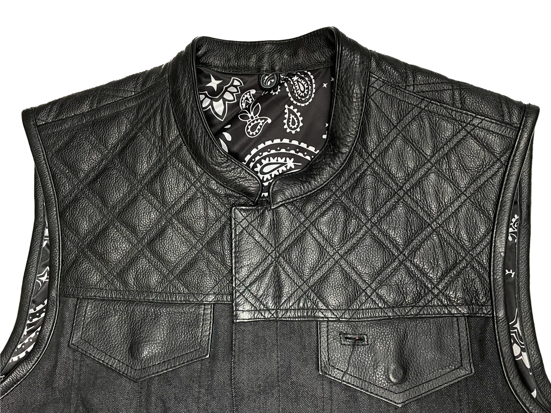The Club Diamond premium black leather/denim club style vest with Black DIAMOND STITCHING front and back Leather shoulder panels. The lining is Black and White paisley pattern with a black denim lower half. It has a tab style collar, front snap/zippered closure. It has inside conceal carry pockets, front chest pockets and lower front side pockets. Available in our Smyrna, TN shop just outside of Nashville. Sizes available from small to 6x.