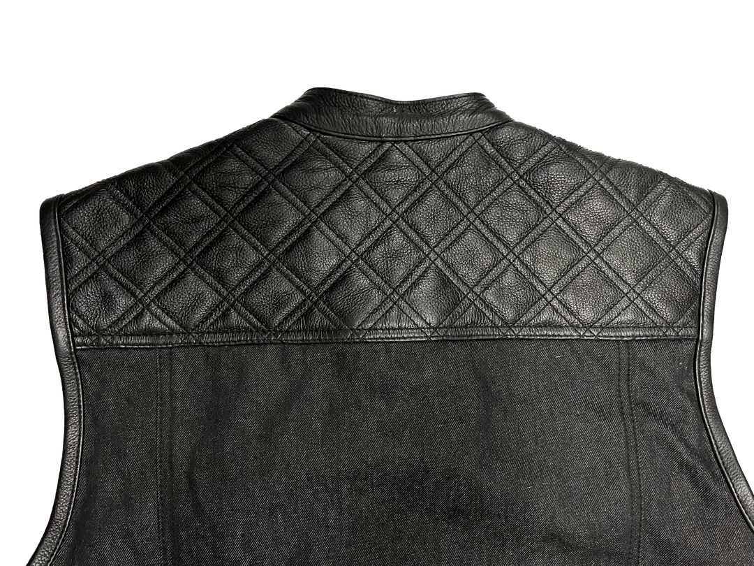 The Club Diamond premium black leather/denim club style vest with Black DIAMOND STITCHING front and back Leather shoulder panels. The lining is Black and White paisley pattern with a black denim lower half. It has a tab style collar, front snap/zippered closure. It has inside conceal carry pockets, front chest pockets and lower front side pockets. Available in our Smyrna, TN shop just outside of Nashville. Sizes available from small to 6x.