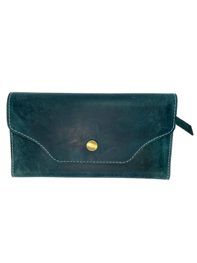 Leather Long Clutch Style Wallet with 4 card slots, I.D. slot, cash and coin pocket, zippered pocket. A convenient way to keep everything you need in one place! Imported and Buckle and Hide Approved! Available in Distressed Brown, Grey, Turquoise.