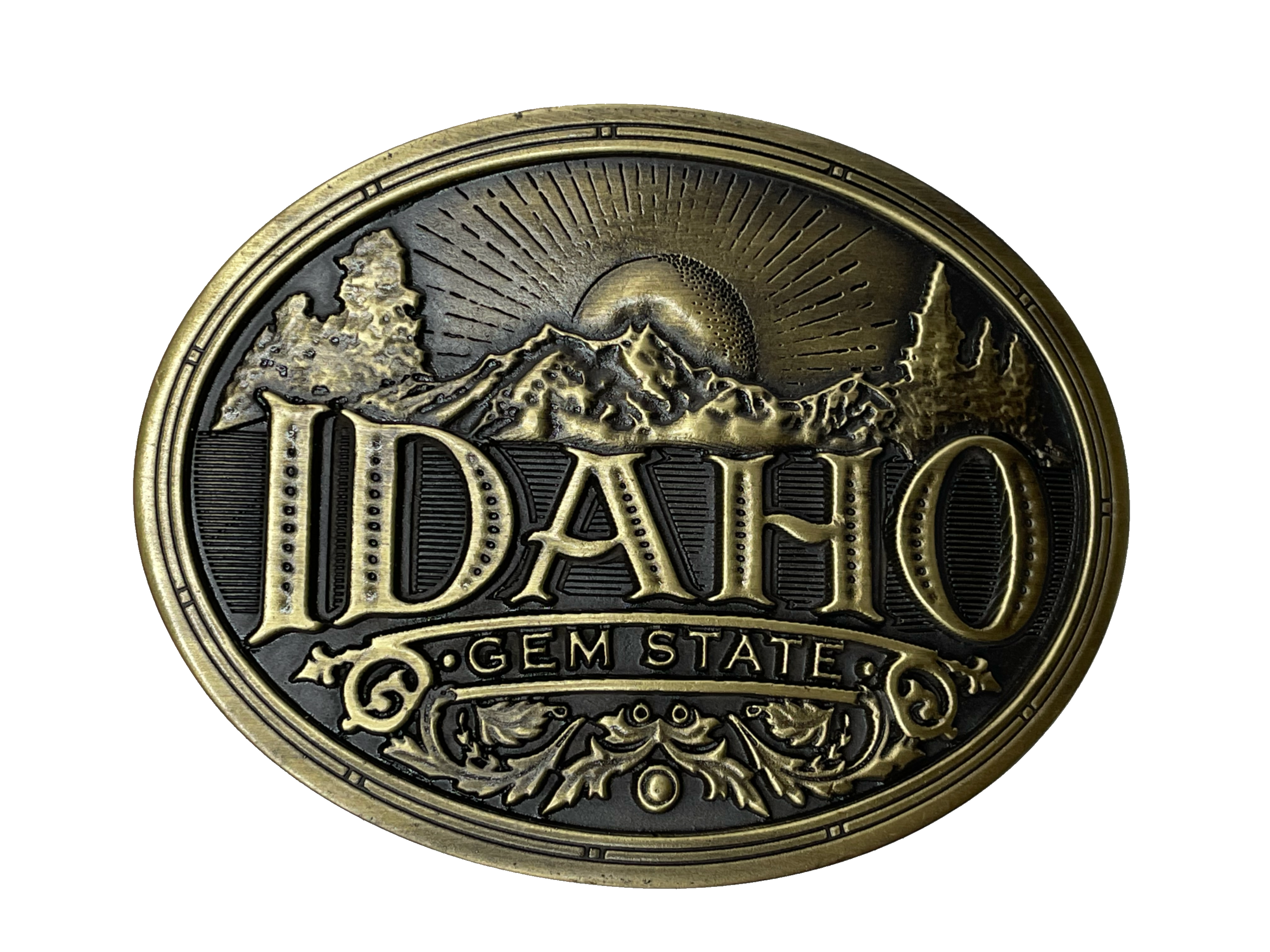 Idaho State buckle by AndWest Dimensions are 3" tall by 3 3/4" wide Fits belts up to 1 1/2" wide Buckle is brass colored with Idaho Gem State embossed across front of buckle. Mountain scene in the back behind "Idaho". Back of buckle has Western scroll design Available in our online store and in the retail shop in Smyrna, TN, just outside of Nashville. Made in Mexico