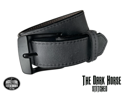 This gray leather belt is made from Crazy Horse tanned leather for that distressed and pull-up look. Choose with or without black stitching along the edges.  Has smooth black painted edges. It has a black Zinc buckle that is snapped in place. Belt is 1 1/2" wide and available in lengths from 34" to 44".  It is handmade in our shop in Smyrna, TN, just outside of Nashville.