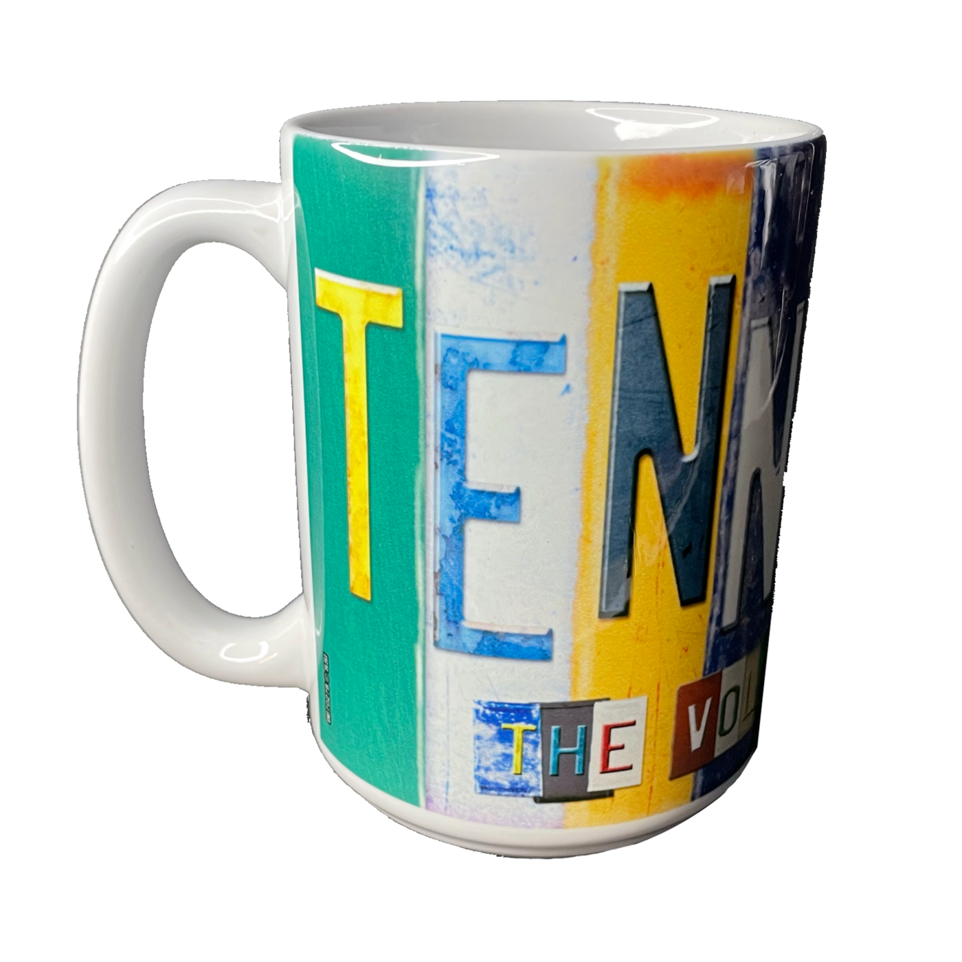 Enjoy your favorite coffee in this Tennessee coffee mug! White ceramic coffee mug with license plate letters spelling out "TENNESSEE".  Available online or in our shop just outside Nashville in Smyrna, TN. 