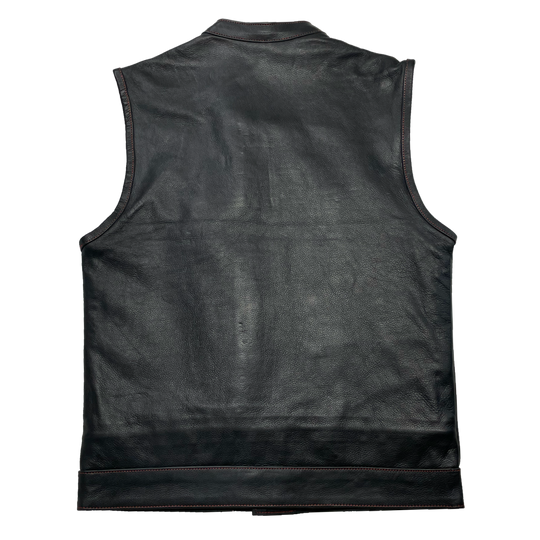 The Jackson Red is a black riding vest made from premium naked cowhide leather. It has CONTRASTED RED STITCHING, and PLAID FLANNEL LINING of black, red, and white. It features: a tab style collar, snap front and zippered closure, solid panel back, two lower front snap pockets, front chest snap pockets, and inside conceal carry pockets on each side. Available in our Smyrna, TN shop just outside of Nashville. Sizes available from Small to 6XL.