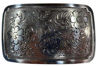 Rectangular antique silver colored belt buckle with Western style tooling, approx. size is 3 1/4" wide by 2" tall. Belt is made from zinc and is imported. Available online and at our shop just outside Nashville in Smyrna, TN.