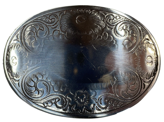 Oval shaped antique silver colored belt buckle with western style tooling, Smaller size approx. 3"wide by 2" tall. Available online and at our shop just outside Nashville in Smyrna, TN. Buckle is imported and made from zinc.