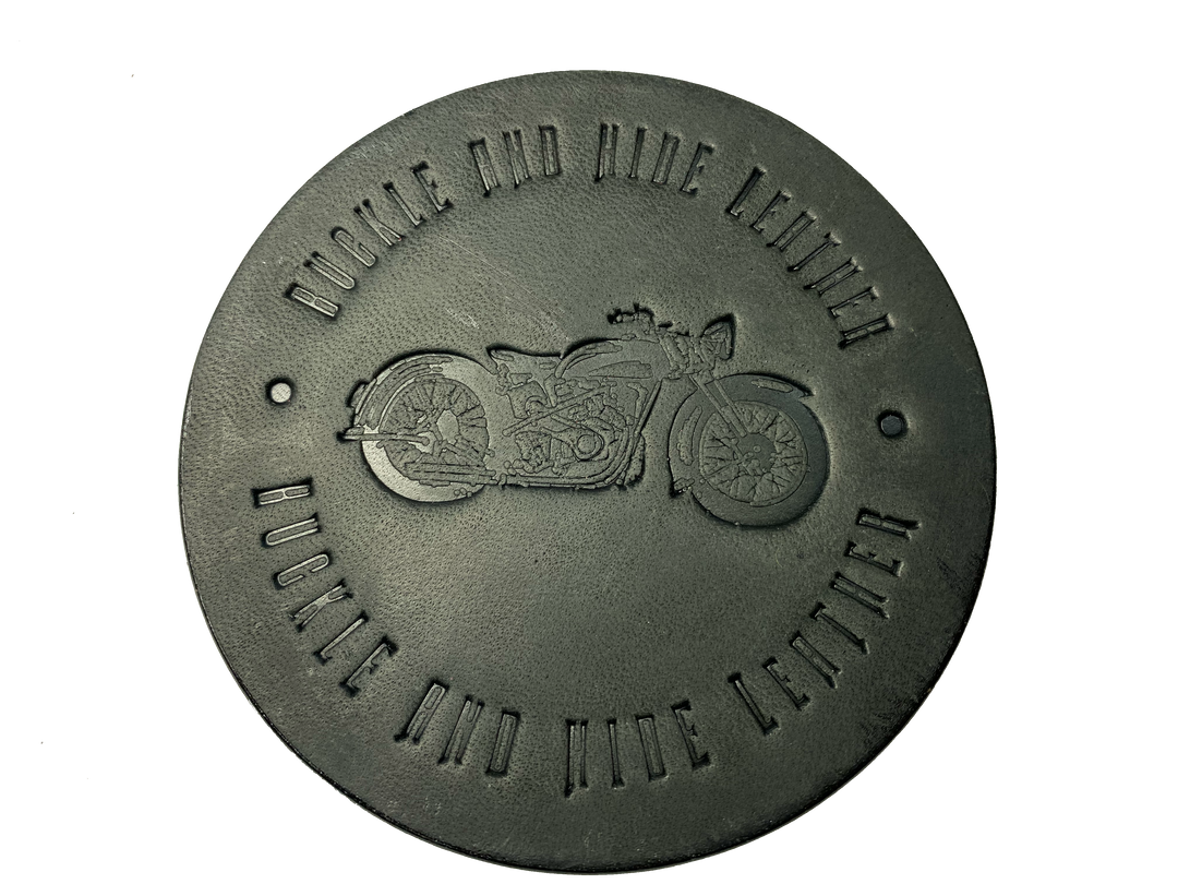 Made in our shop from Approx. 1/8" thick bridle Leather. A salute to all the Motorcycle riders who shop at our shop and everyone who loves Bikes! Embossed with Buckle and Hide graphics and a vintage motorcycle. Choose Black or Med. Brown. Purchase individually or in a custom tin. BUY MORE and SAVE! Not pictured yet!
