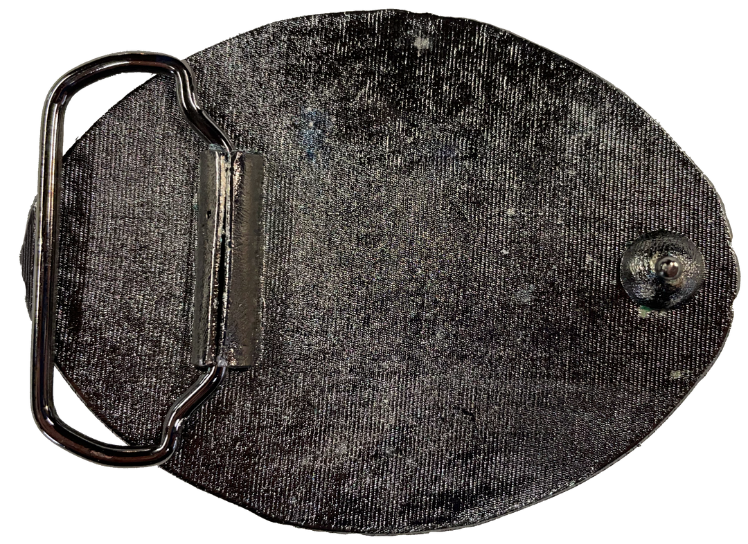 Pewter belt buckle that may be attached to your belt.  It has a western style oval shape with Black epoxy inlay cross in the center. Fits 1 1/2" belts, Size 3-1/2" x 2-3/4. Available in our shop just outside Nashville in Smyrna, TN. Back of buckle pictured.