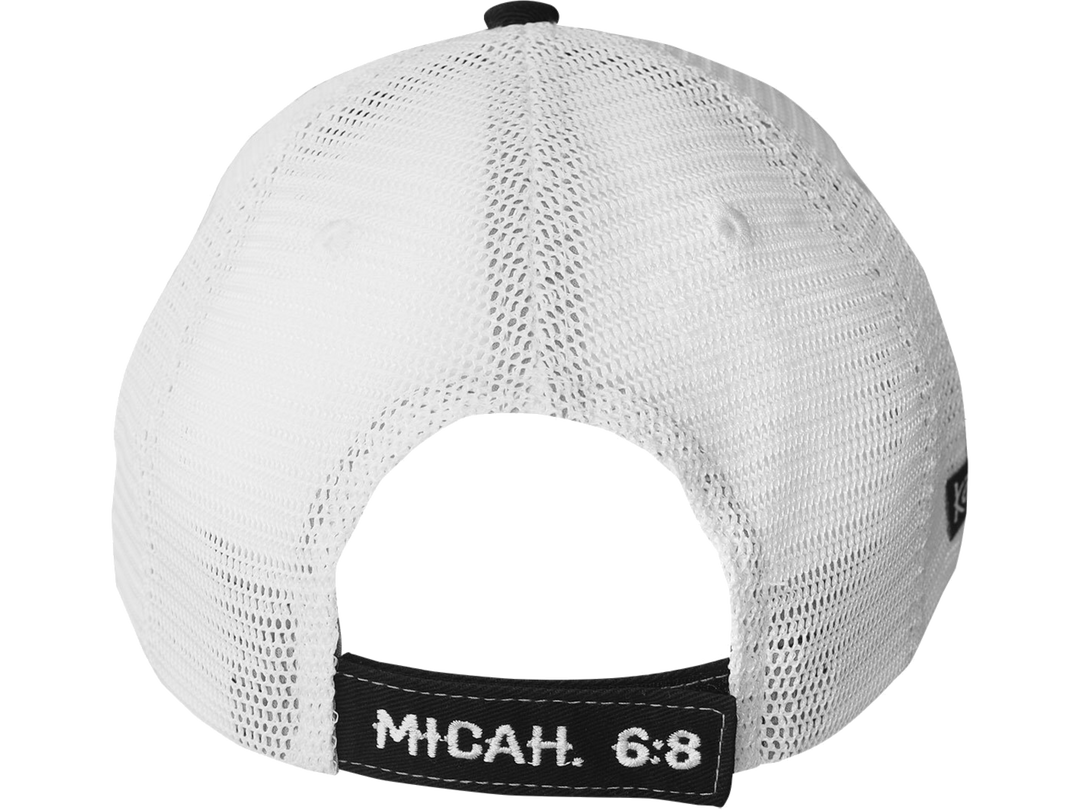 Walk the walk in this sharp “Walk Humbly” Cap by Kerusso® in Black/White with topstitch detailing. God asks us to set aside the lower points of our character when we take up the cross and follow Him. God’s Holy Word, the Bible, shows us how. Available online or in our shop just outside Nashville in Smyrna, TN. One size fits most, back view.