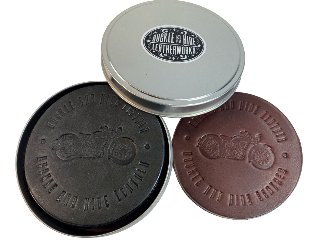 Made in our shop from Approx. 1/8" thick bridle Leather. A salute to all the Motorcycle riders who shop at our shop and everyone who loves Bikes! Embossed with Buckle and Hide graphics and a vintage motorcycle. Choose Black or Med. Brown. Purchase individually or in a custom tin. BUY MORE and SAVE! Not pictured yet!