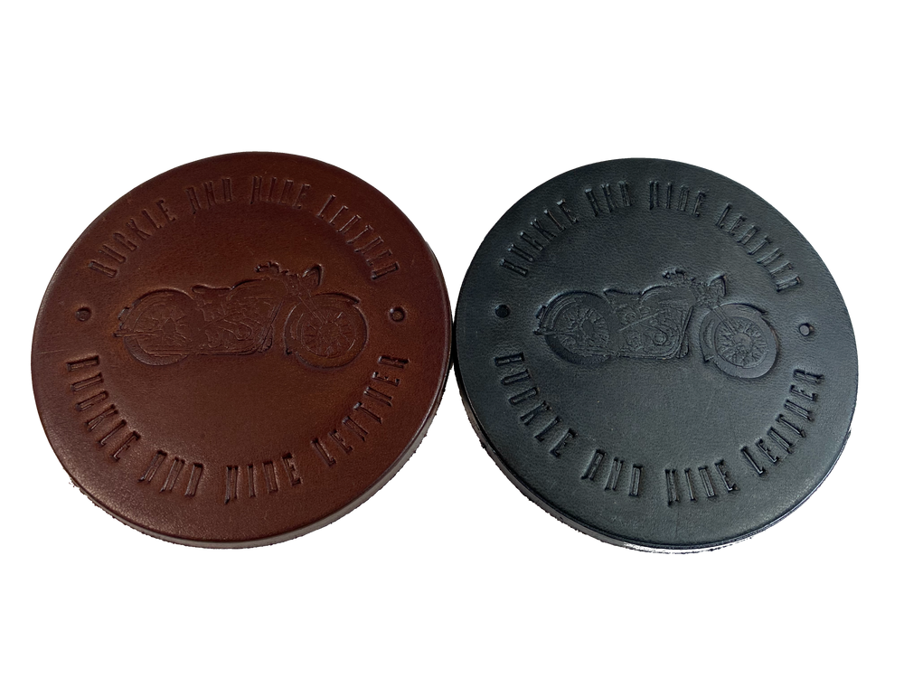 Made in our shop from Approx. 1/8" thick bridle Leather. A salute to all the Motorcycle riders who shop at our shop and everyone who loves Bikes! Embossed with Buckle and Hide graphics and a vintage motorcycle. Choose Black or Med. Brown. Purchase individually or in a custom tin. BUY MORE and SAVE! Not pictured yet!