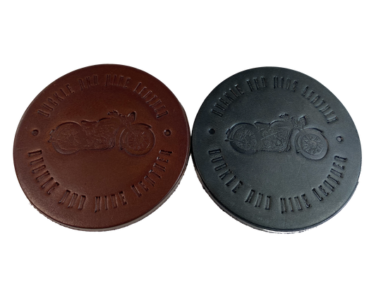 Made in our shop from Approx. 1/8" thick bridle Leather. A salute to all the Motorcycle riders who shop at our shop and everyone who loves Bikes! Embossed with Buckle and Hide graphics and a vintage motorcycle. Choose Black or Med. Brown. Purchase individually or in a custom tin. BUY MORE and SAVE! Not pictured yet!