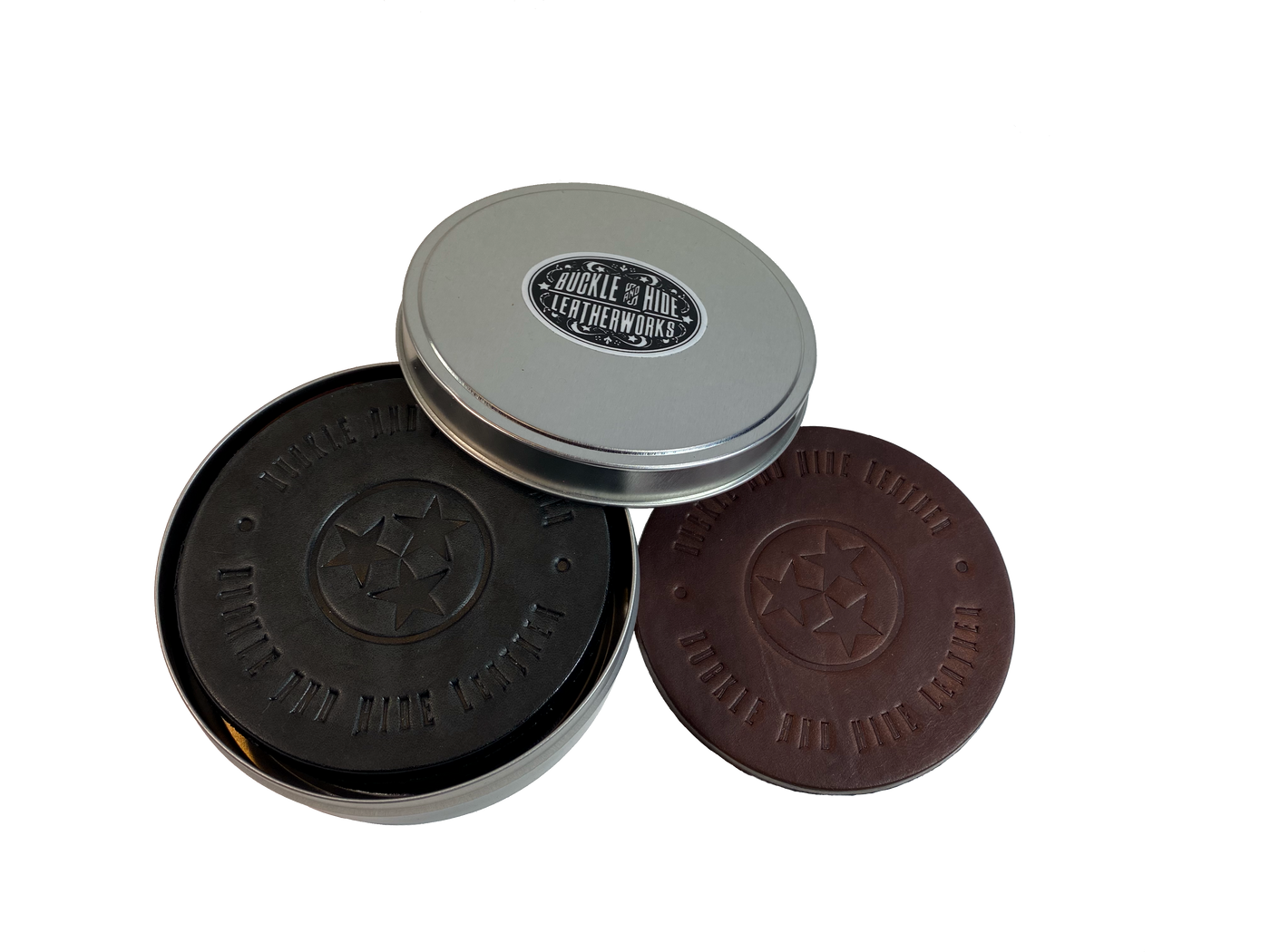 Made in our shop from Approx. 1/8" thick bridle Leather. A salute to all Volunteers who shop at our shop and everyone who loves Tennessee! Embossed with Buckle and Hide graphics and a Tennessee Tristar. Choose Black or Med. Brown. Purchase individually or in a custom tin. BUY MORE and SAVE! 