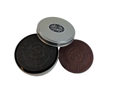 Made in our shop from Approx. 1/8" thick bridle Leather. A salute to all Volunteers who shop at our shop and everyone who loves Tennessee! Embossed with Buckle and Hide graphics and a Tennessee Tristar. Choose Black or Med. Brown. Purchase individually or in a custom tin. BUY MORE and SAVE! 