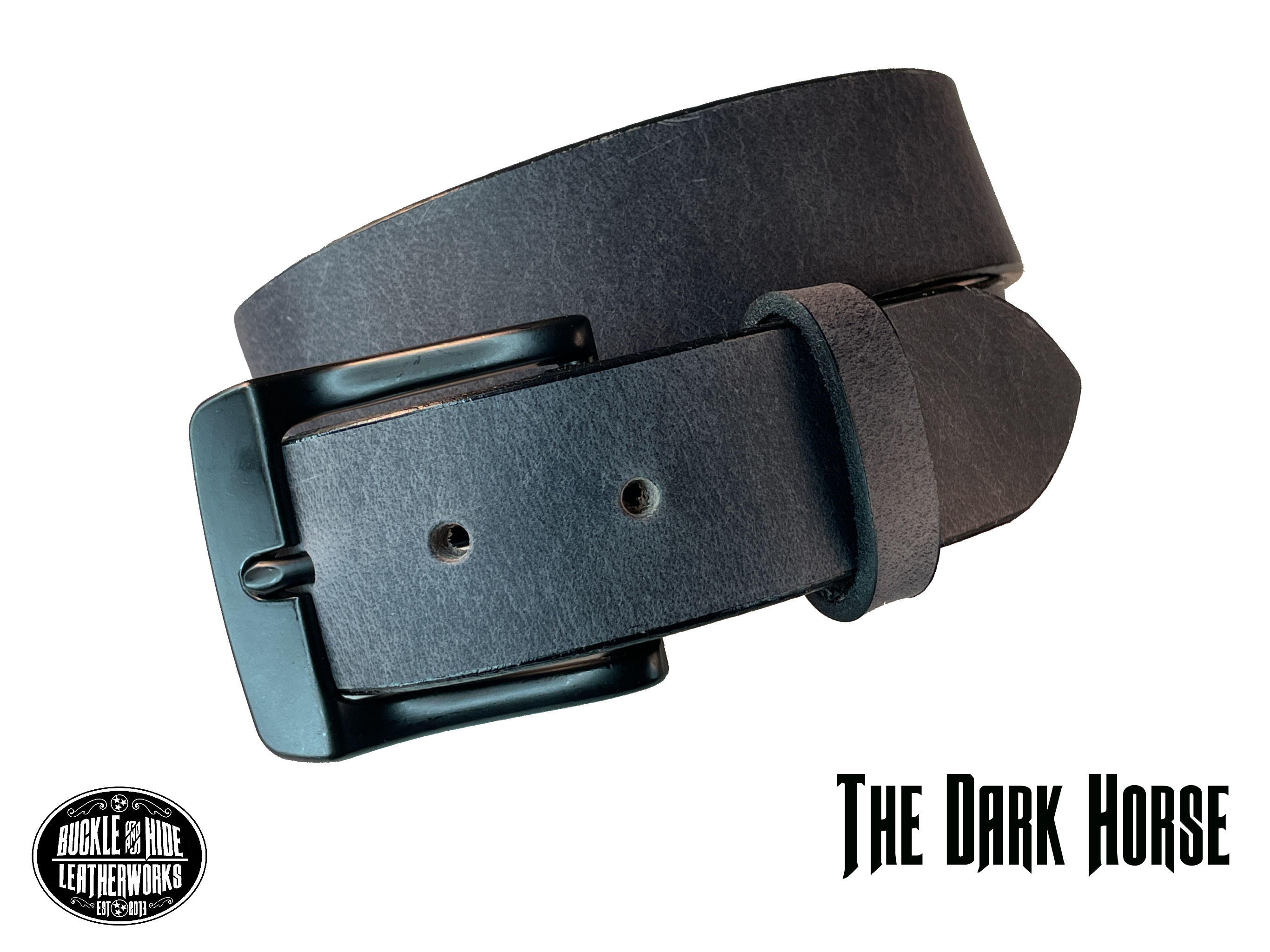This gray leather belt is made from Crazy Horse tanned leather for that distressed and pull-up look. Choose with or without black stitching along the edges.  Has smooth black painted edges. It has a black Zinc buckle that is snapped in place. Belt is 1 1/2" wide and available in lengths from 34" to 44".  It is handmade in our shop in Smyrna, TN, just outside of Nashville.