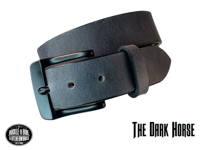 This gray leather belt is made from Crazy Horse tanned leather for that distressed and pull-up look. Choose with or without black stitching along the edges.  Has smooth black painted edges. It has a black Zinc buckle that is snapped in place. Belt is 1 1/2" wide and available in lengths from 34" to 44".  It is handmade in our shop in Smyrna, TN, just outside of Nashville.