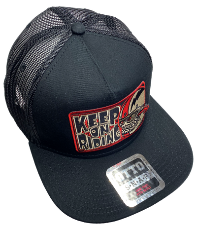 Flat Bill Cap with mesh back. Front has a red embroidered patch that says "Keep on Riding" and has a "Bobber Monster" graphic. Structured top to keep its shape. Sold at our shop just outside Nashville in Smyrna, TN.